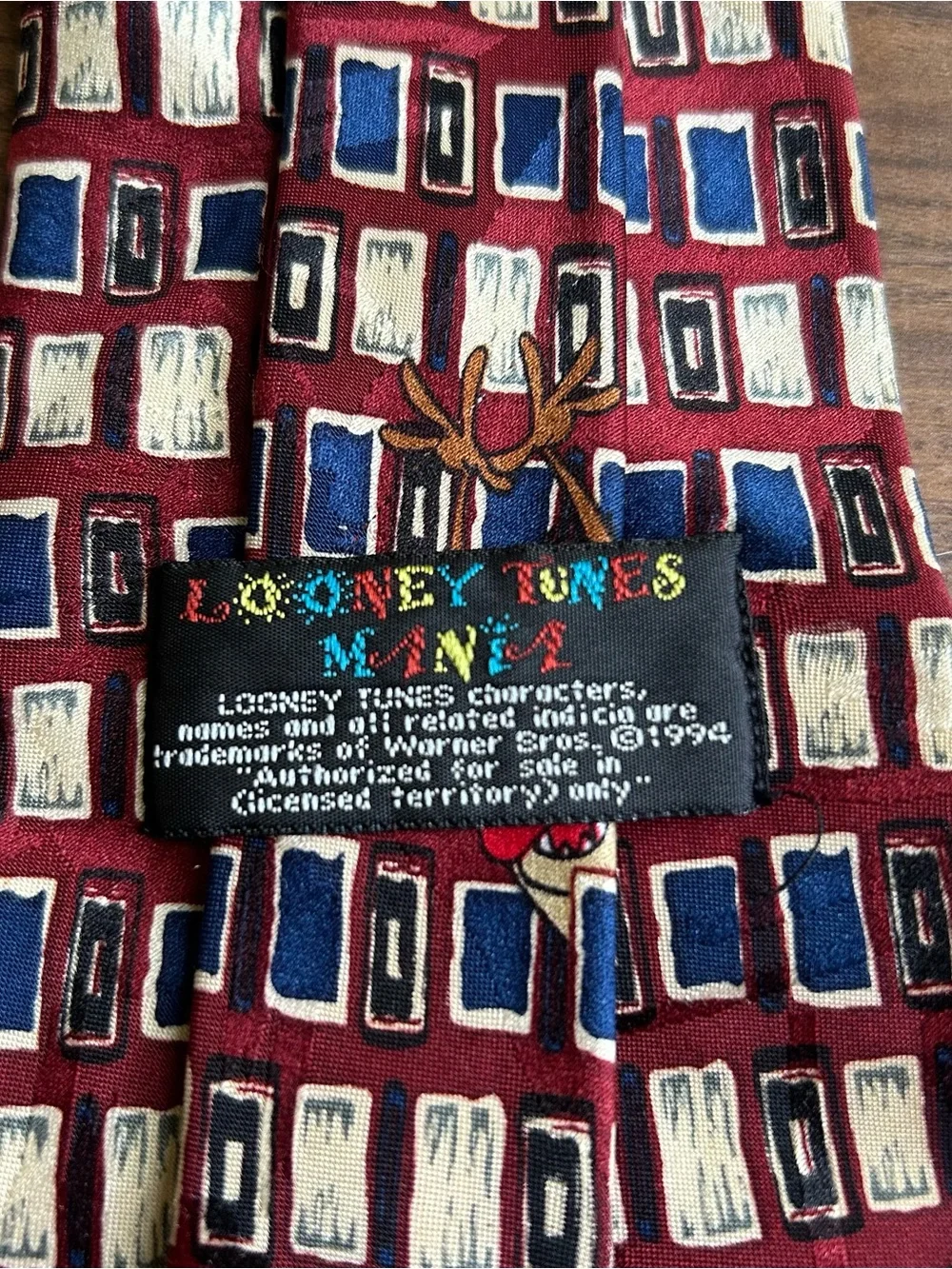Looney toons 1994. Burgundy tie with yellow & blue box pattern & taz characters